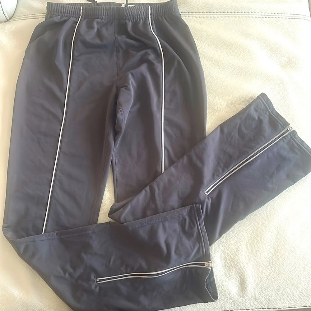 Nike women dri-fit track pants w zipper vents grey in xs has reflective trims